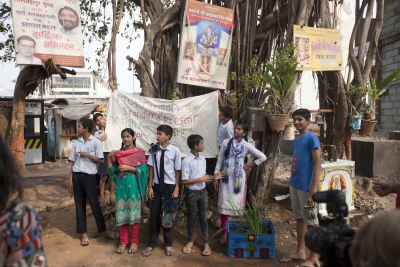 The 'more trees' group present their designs under the banyan tree in Mariamma Nagar